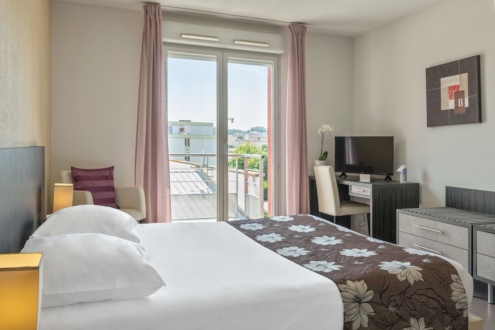 Park And Suites Confort Toulouse Lhers in Millau, France
