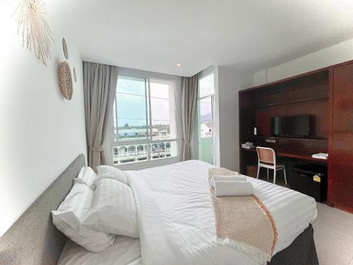 Chalong Inn Phuket 20463332 — Song