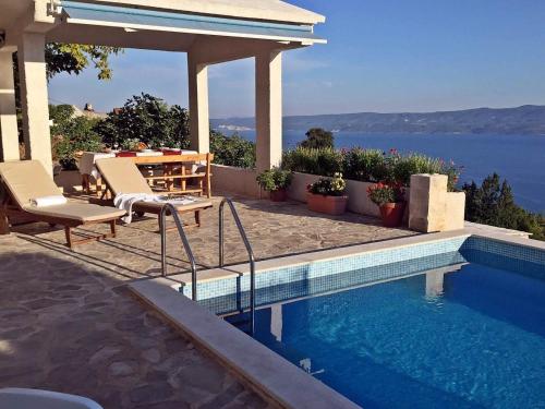Holiday house in Sumpetar Jesenice with sea view terrace air conditioning WiFi 5133 1 — 4-Star Luxury Hotel in Jesenice, Croatia
