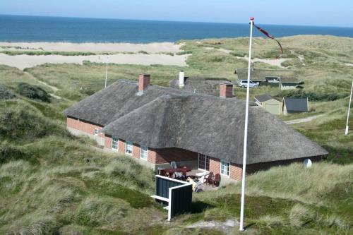 Thatched house with pool by the sea SJ690 — 4-Star Luxury Hotel in Harboore, Denmark