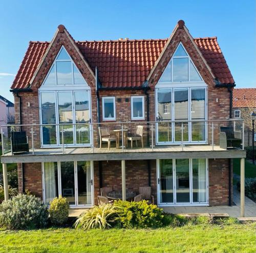 Pearl & Spice Hideaways 2 two bedroom cottages nearby Part of the The Bay Filey Holiday Village with pool gym and direct beach access pub restaurant tennis and meadows walks