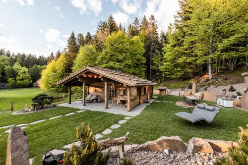La Mendola Alm Chalet — 4-Star Luxury Hotel in Cavareno, Italy