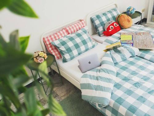 Single Beds Private Bath & Balcony Shared Kitchen with Local Family by Pillows & Purrs