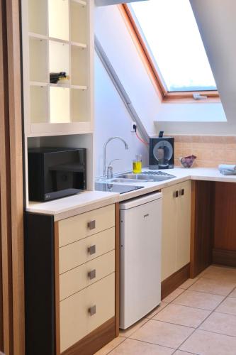 Trón Apartman — Siklos — photo 4