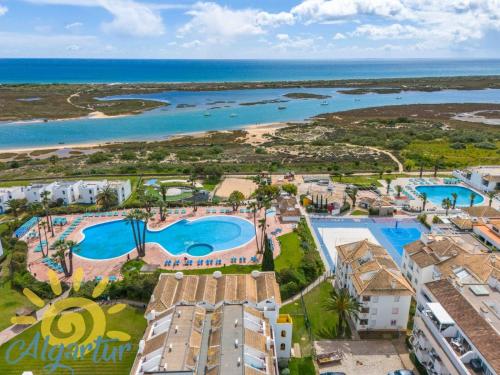Sunny Golden 1BDR Apartment w Beach & Pool Access Included — 4-Star Luxury Hotel in Cabanas De Tavira, Portugal