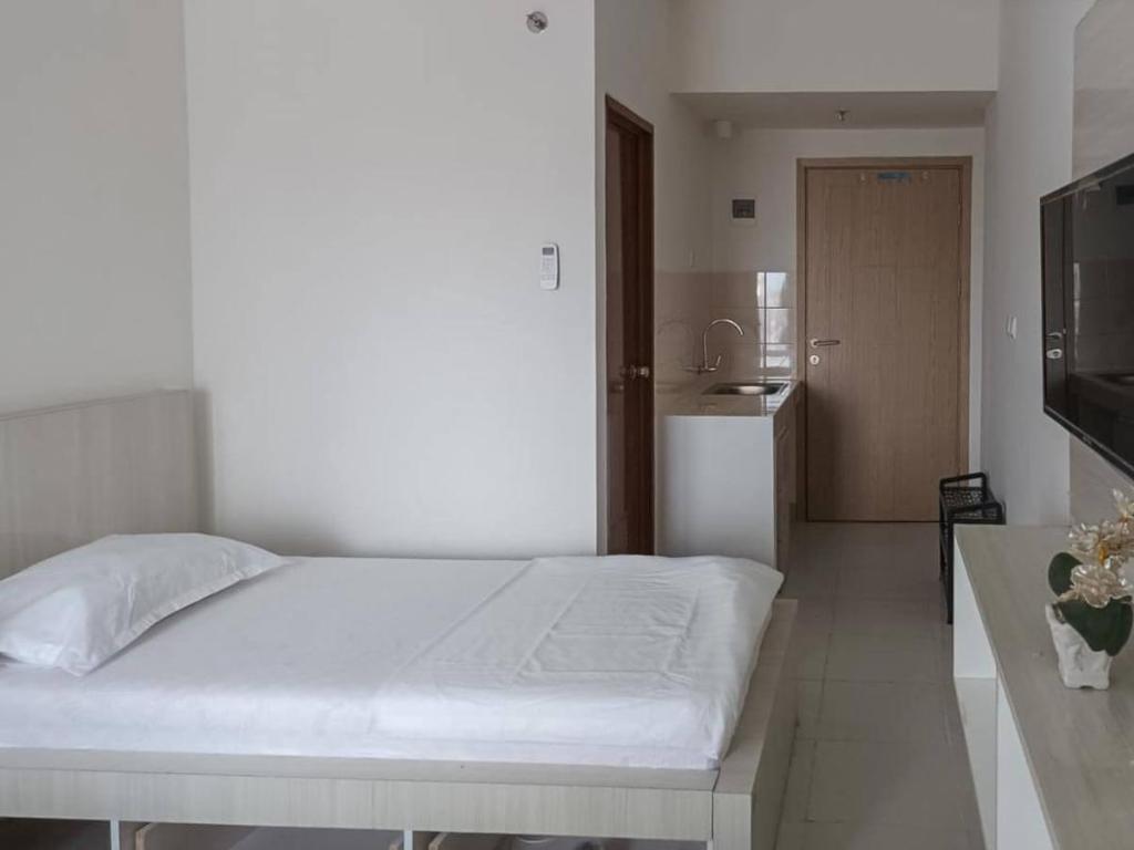 Redliving Apartemen Jasmine Park Bogor Pelangi Room B1