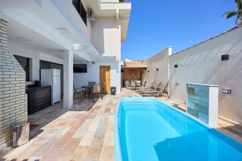 Casas 01 OU 02 Piscina Churrasqueira quartos com ar condicionado Tv smart 43 ventilador in Ubatuba, Brasil