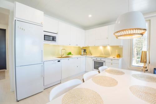 Apartment Tuomenkartano C4 iso huoneisto saunalla Kalajoki — 4-Star Luxury Hotel in Kalajoki, Finland