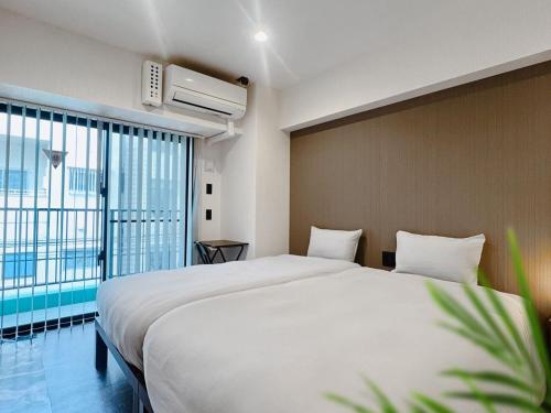 Woodside Studio - carbon neutral hotel in Okinawa