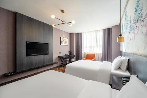 TOWO Shangpin Hotel Xi'an Xi'an Line 1 Kaiyuanmen Metro Station — 4-Star Luxury Hotel in Xi'an, People's Republic of China
