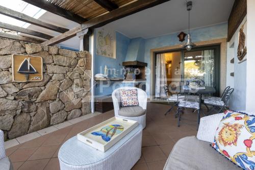 23 BAIA FARO Trilocale mansardato con ampia terrazza vista mare — 4-Star Luxury Hotel in Palau, Italy