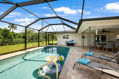 Your Private Escape with Heated Saltwater Pool — 4-Star Luxury Hotel in Cape Coral, United States
