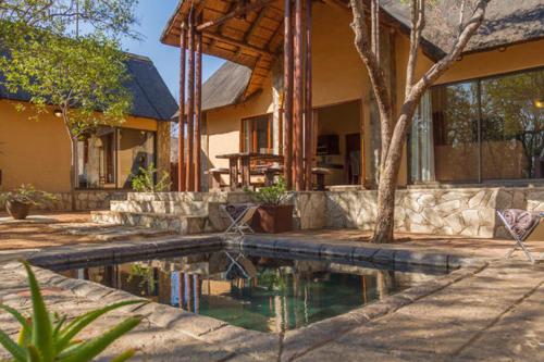 Warthogs Rest — 4-Star Luxury Hotel in Hoedspruit, South Africa