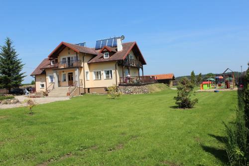 Oaza Mazurska Domek z kominkiem in Piecki, Poland