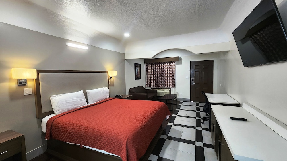 Scottish Inns & Suites Sam Houston Pkwy - photo 4