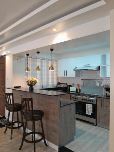 Azania cozy Units 5 minutes to Sarit Centre