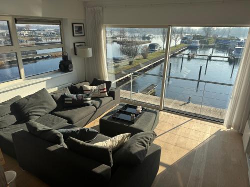 The Boathouse with boat — 4-Star Luxury Hotel in Aalsmeer, Netherlands