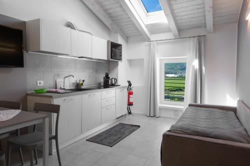 Appartamento Campagnola Mansardato — 4-Star Luxury Hotel in Riva Del Garda, Italy