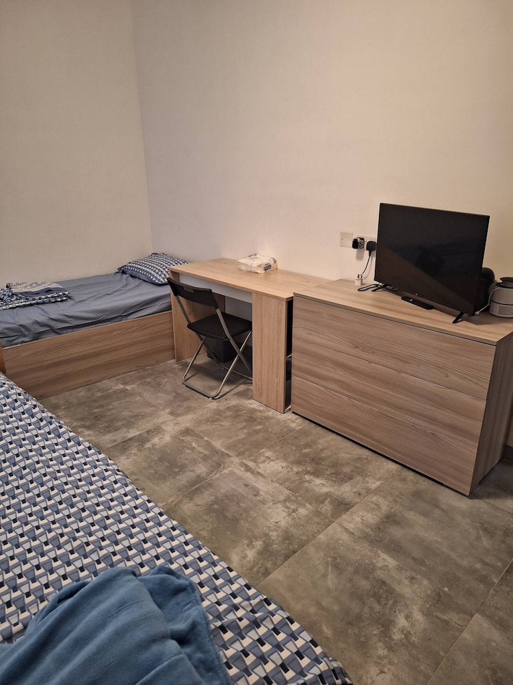 Private cosy room in a modern suburban penthouse in Luqa, Malta