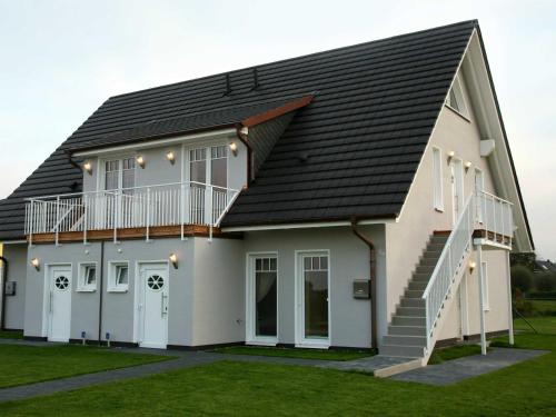 Strandmuschel Kamin 250 m Strand — 4-Star Luxury Hotel in Boergerende-Rethwisch, Germany