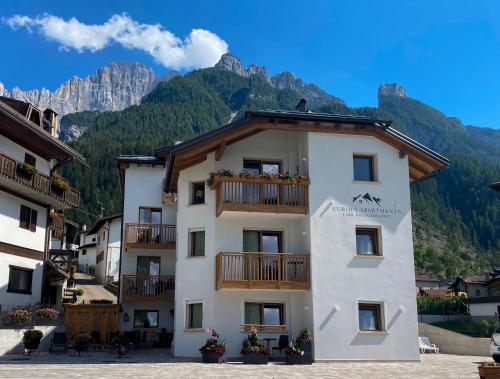 Europa Mountain Apartments — 4-Star Luxury Hotel in Alleghe, Italy