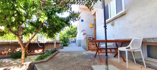 Apartment Vega with private garden terrace and garage — 4-Star Luxury Hotel in Sibenik, Croatia