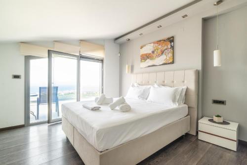 Endless Blue Maisonette — Kokkini Chani — photo 2