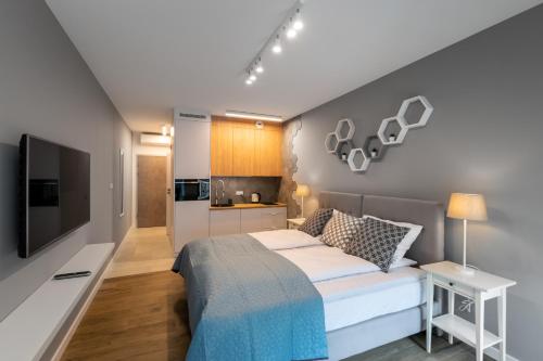 Rajska 3 Grey Apartment Krakow City — 4-Star Luxury Hotel in Krakow, Poland