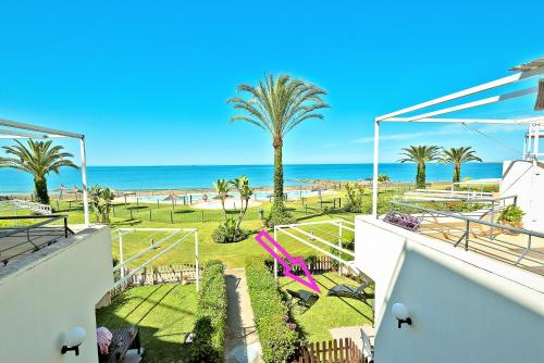 On Beach Deluxe Apartment with Pools and own Garden — 4-Star Luxury Hotel in El Puerto De Santa Maria, Spain