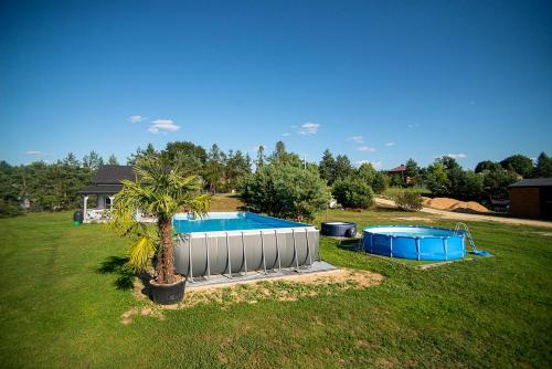 Agroturystyka domki nad rzeką Bałtów kajaki rowery klima basen ryby full pet-friendly hotel Cmielow