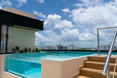 Elegant Lux Condo Fast Wi fi Near the Beach — 4-Star Luxury Hotel in Playa Del Carmen, Mexico