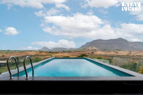 StayVista at Majestic Whispers with Rooftop Pool in Nashik, India