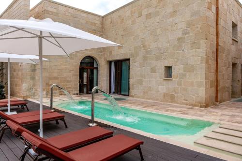 Palazzo Corte Dei Granai Raro Villas Homes Collection — 4-Star Luxury Hotel in Maglie, Italy