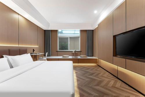 沃德smart酒店曹县汽车站店 - carbon neutral hotel in Heze