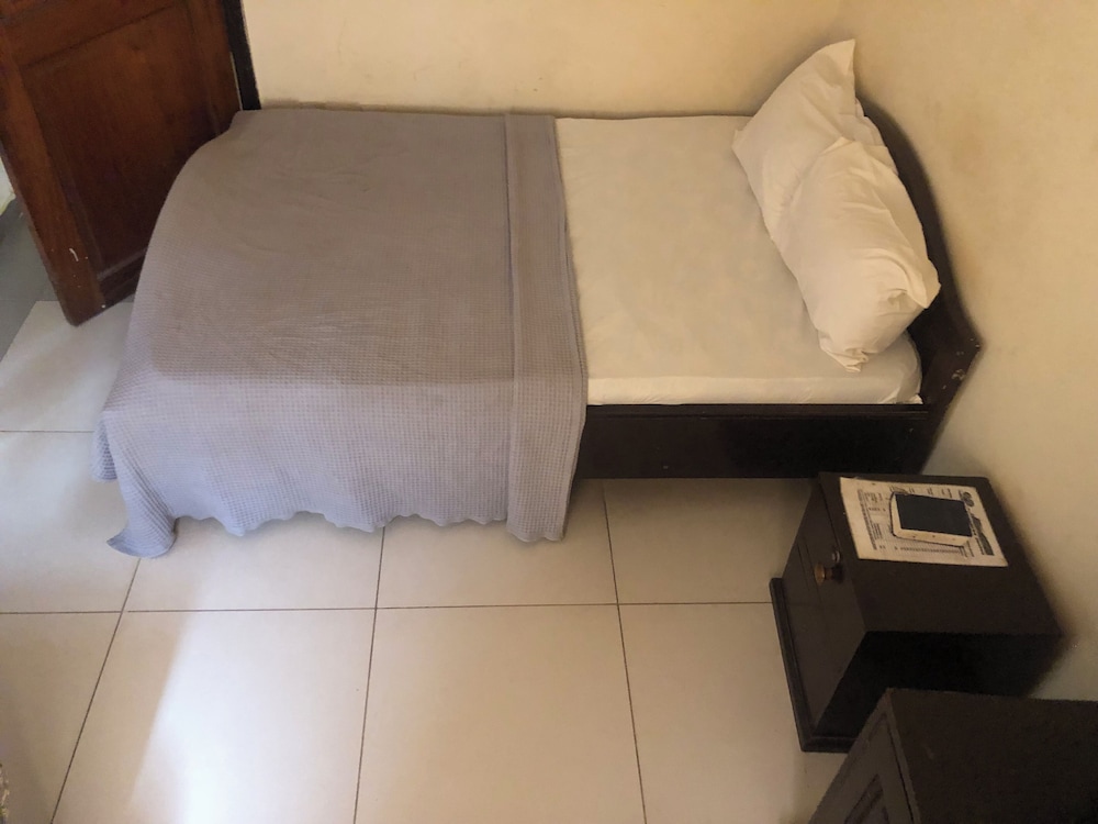 Omega Hotel Complex in Unknown City, Ghana