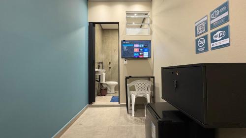 Suíte 10 Praia das Pitangueiras in Guaruja, Brasil