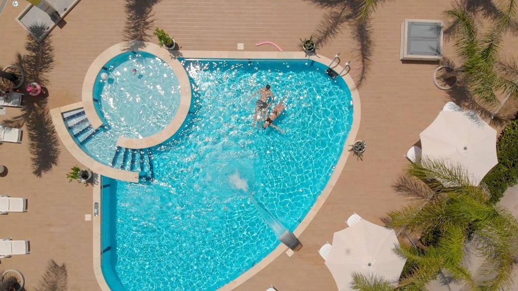 Attico Vista Mare e Piscina — 4-Star Luxury Hotel in Ispica, Italy
