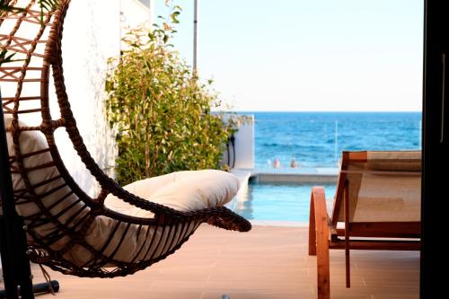 Villa Dorra Coast Suites — 4-Star Luxury Hotel in Kanali, Greece