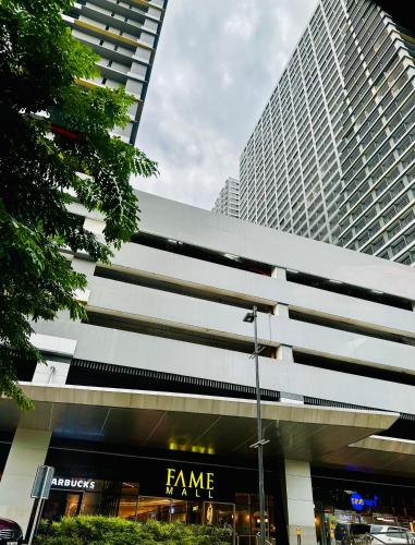 Eastovia Suites city center condo with pool at Fame — 4-Star Luxury Hotel in Manila, Philippines