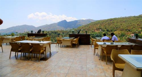 Hotel Whispering Winds in Dharampur, India