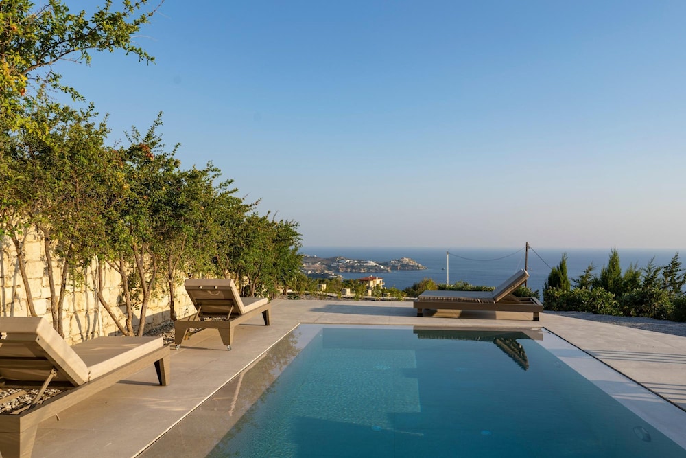 Infinite Blue Apartments — 4-Star Luxury Hotel in None, Greece