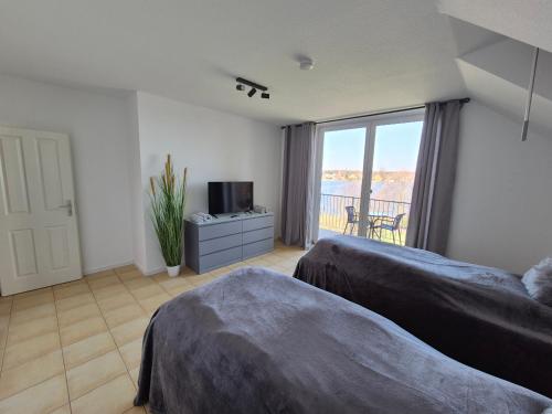 Monteurzimmer 1 mit Seeblick — hotel in Zeuthen