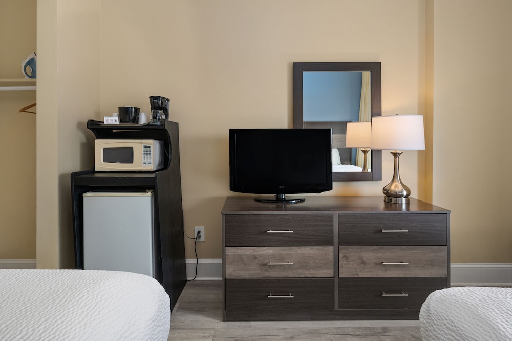 Coastal Palms Inn & Suites - photo 12