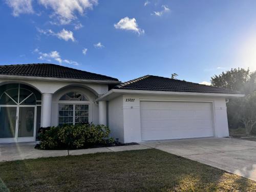 Peachland getaway with pool and tiki bar in Port Charlotte, United States