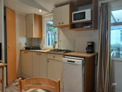 Mobilhome Les volets bleus — hotel in Revel