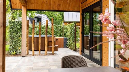 Bos Villa met Hottub & Sauna 8 personen Resort Valley — hotel in Wekerom
