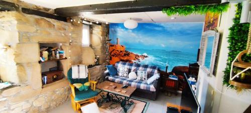 Coeur de Granit Rose Meuble Alliant Le Charme de L'authentique Breton Et du Confort Classe 3 Etoiles a 5mn de 13 Plages de la Reputee Cote de Granit Rose — hotel in Tregastel