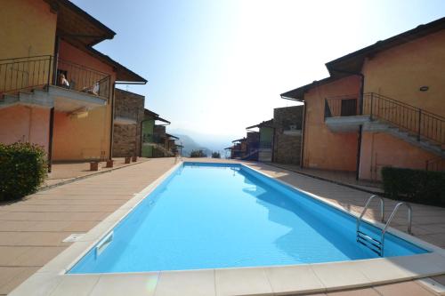 La casa di Gabry in residence con piscina comune — 4-Star Luxury Hotel in Tavernola Bergamasca, Italy