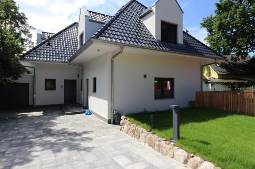 Ferienhäuser Villa Ostseekind — 4-Star Luxury Hotel in Neuhaus, Germany