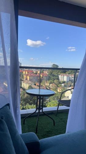 Golden Horizon two bedroom apartment with swimming pool ample parking space fully equipped gym and a relaxing rooftop with breathtaking city views in lavington